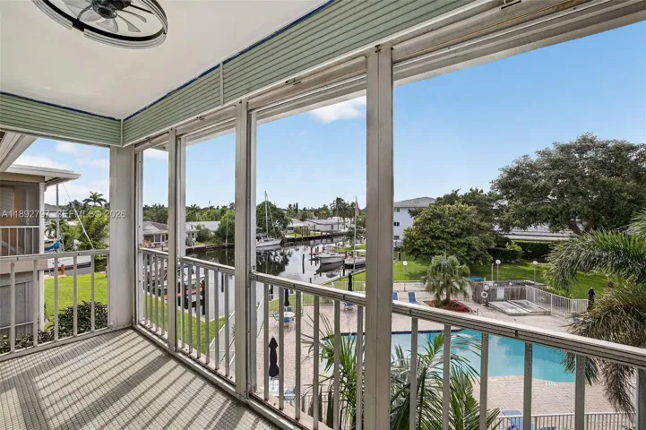 Impact windows to screened Porch overlooking water & pool. Flat Ceilings with high hat lighting. Garden & Water Views. Updated flooring and paint, Impact Windows
