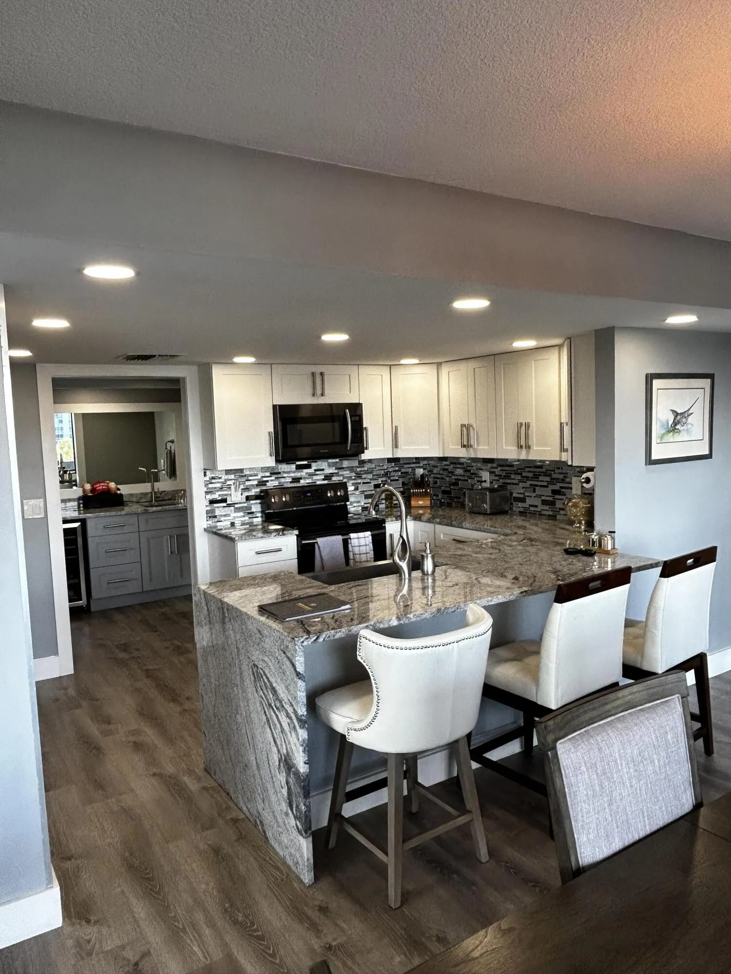 KITCHEN REMODELED WITH WALL REMOVED