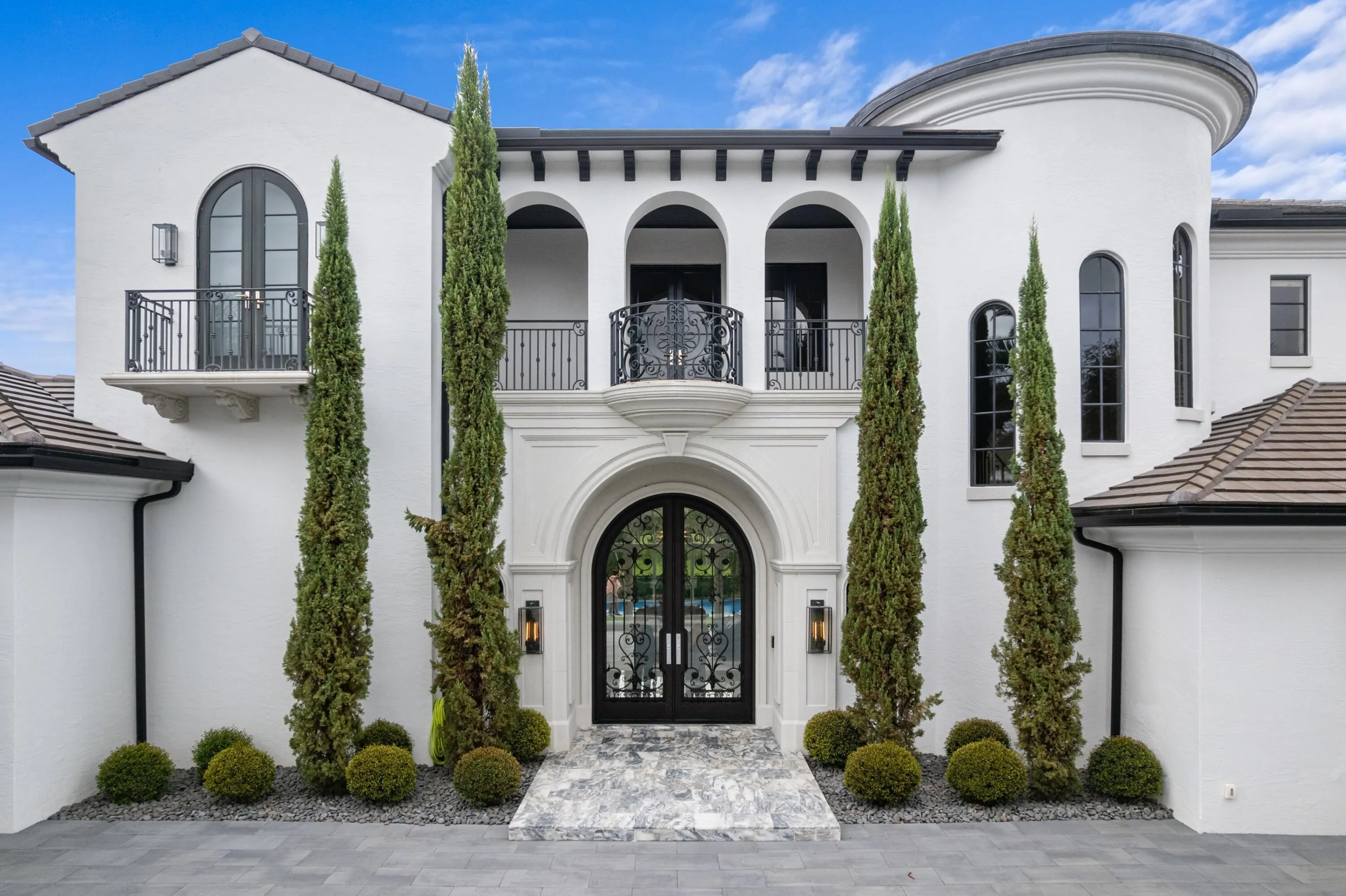 An expert blend of European tradition and modern aesthetic on one of the most private, Mirasol lots