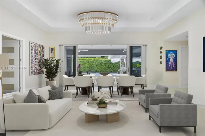 Great room virtually staged as Living and dining room