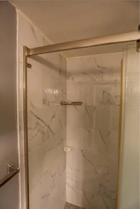 Renovated shower 235 Golden River Dr WPB