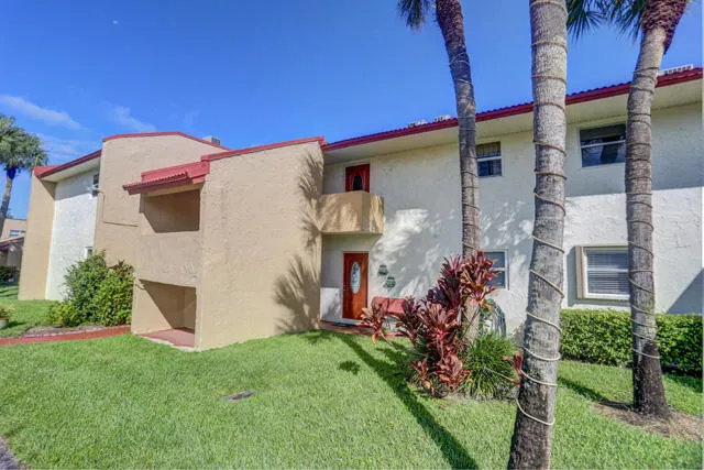 Front SE view 235 Golden River Dr WPB,FL