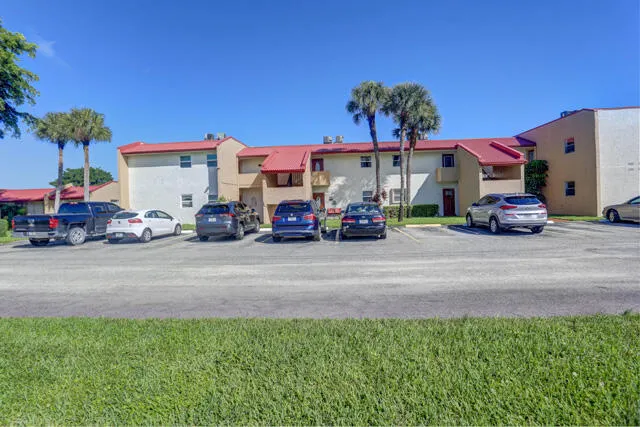 Front wide shot 235 Golden River Dr WPB,