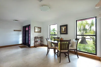 Entrance to house includes four seat meeting table..