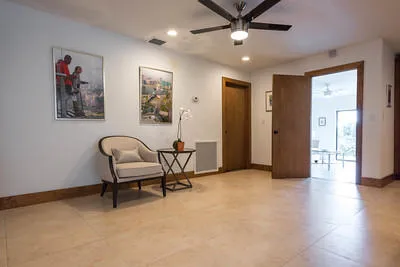 Walkway between kitchen, living room, and back bedrooms