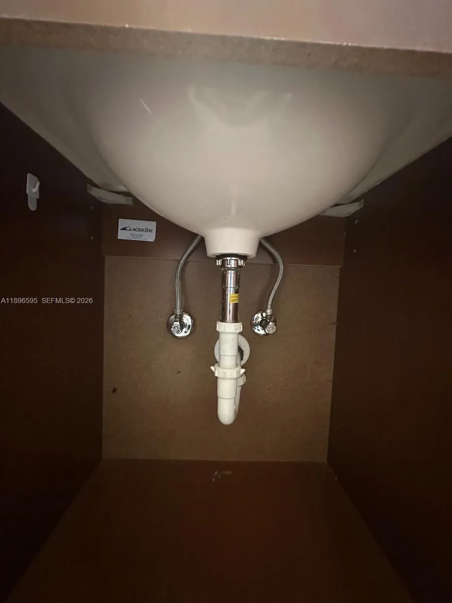 under the sink of the 2nd bathroom