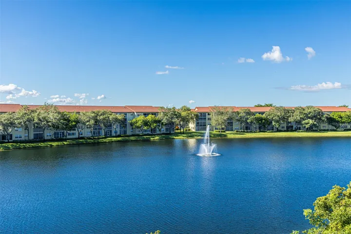 Stunning wide lake views from extended balcony, living area and master bedroom