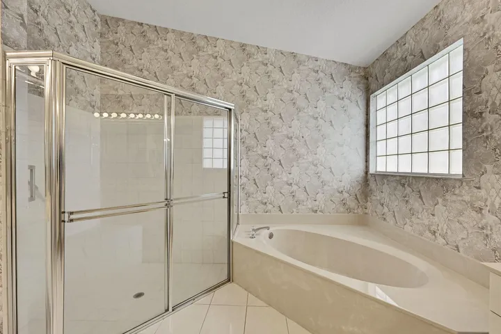 Separate shower and spa tub