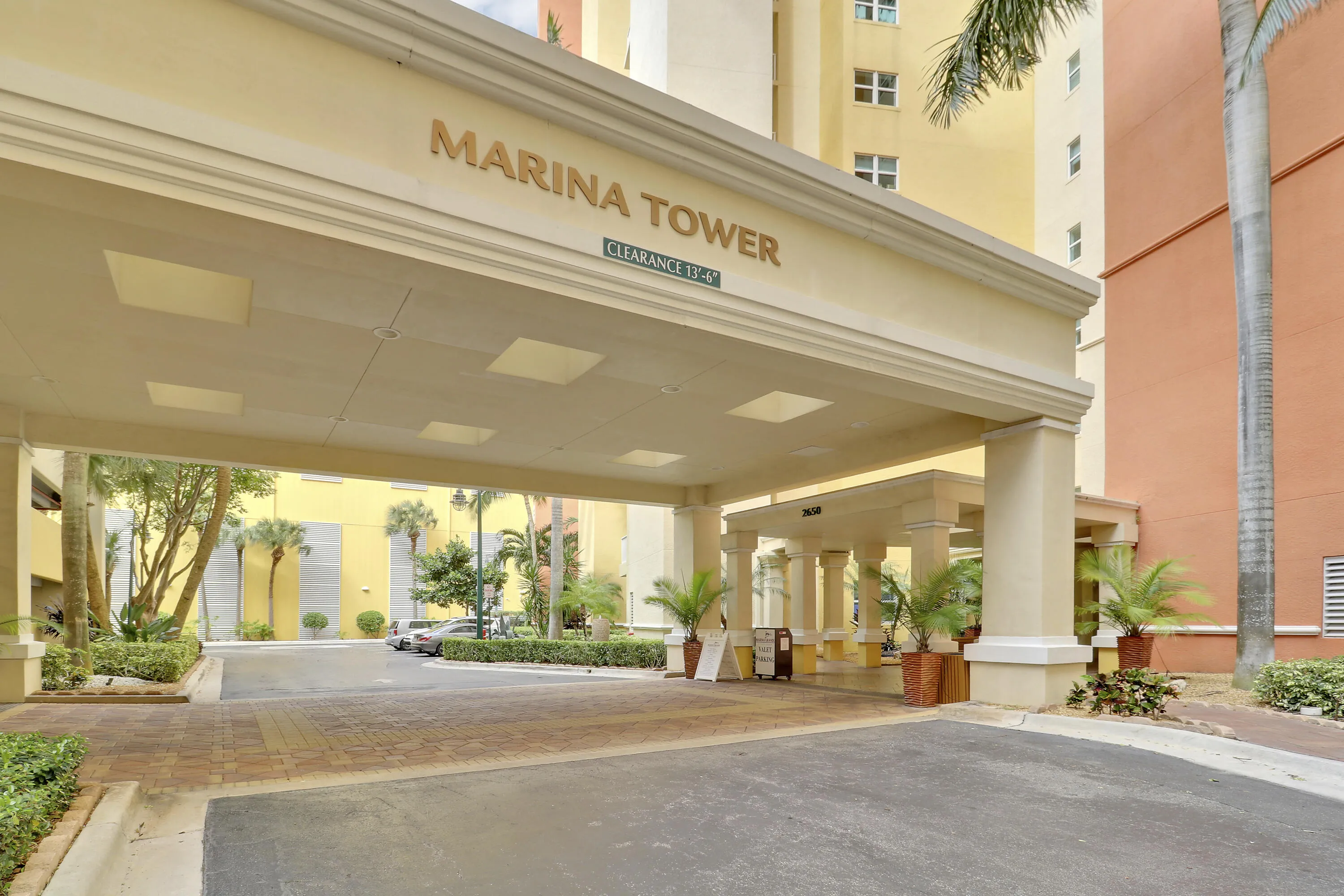This massive porte-cochere offers protection from inclement weather. Valet attendants are also available to assist.
