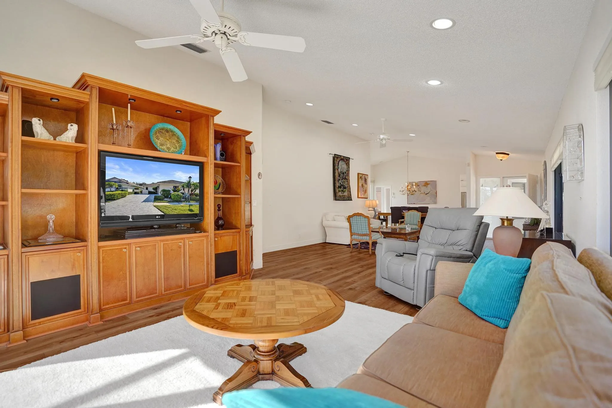 Vaulted Ceiling with High Hat lighting and paddle fan