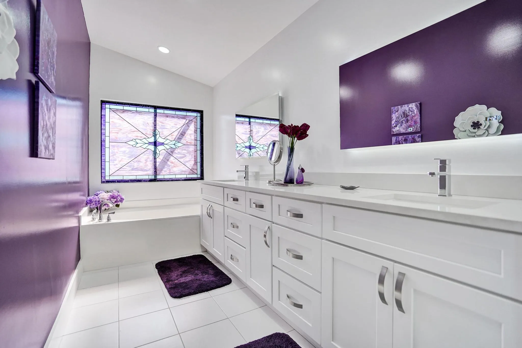 Updated bath with spa-like tub and stain glass window