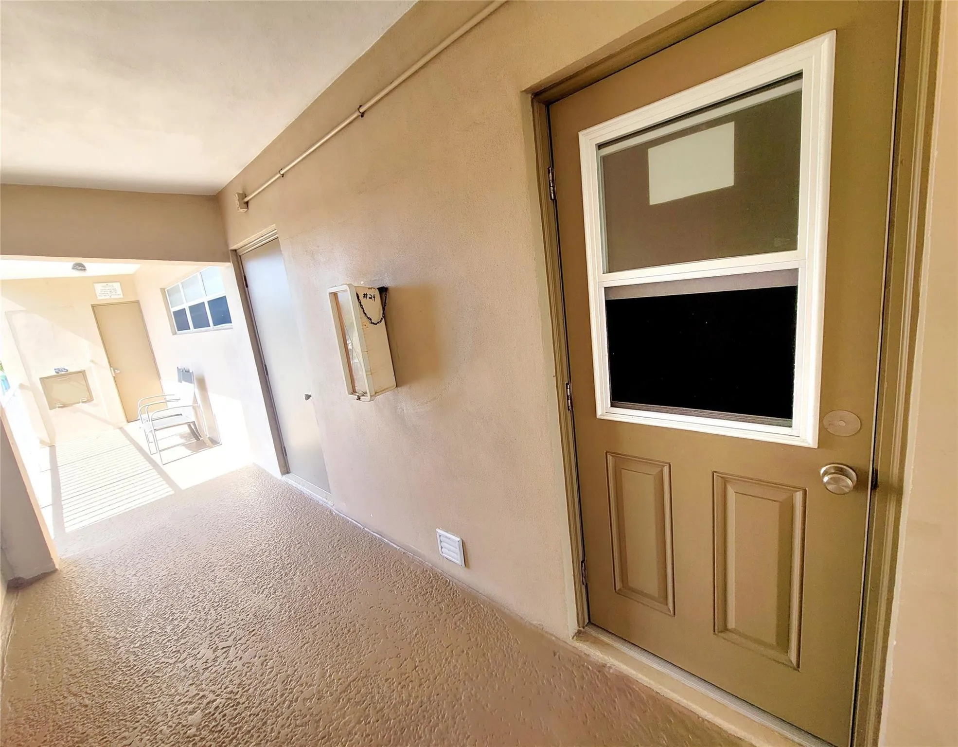 Between elevator & storage