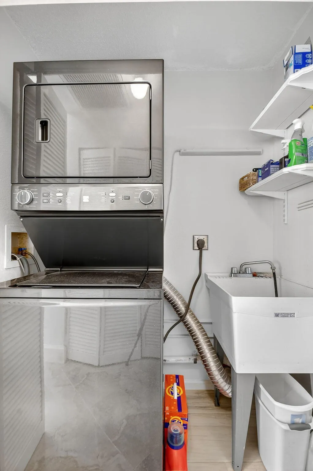 Washer/Dryer (full size) and utility sink