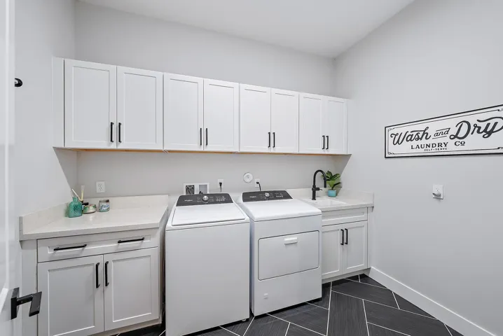 Laundry Room with Ample Storage Cabinetry