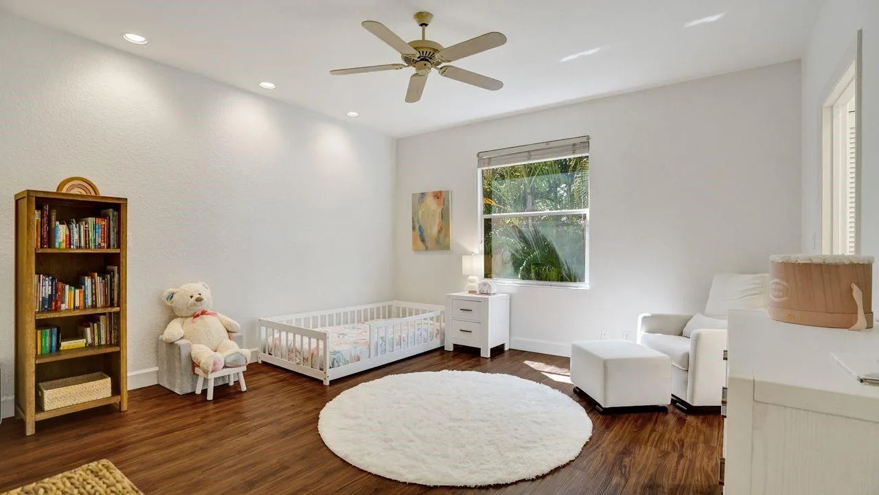 Wood flooring, super spacious bedroom, perfect for kids or guests.