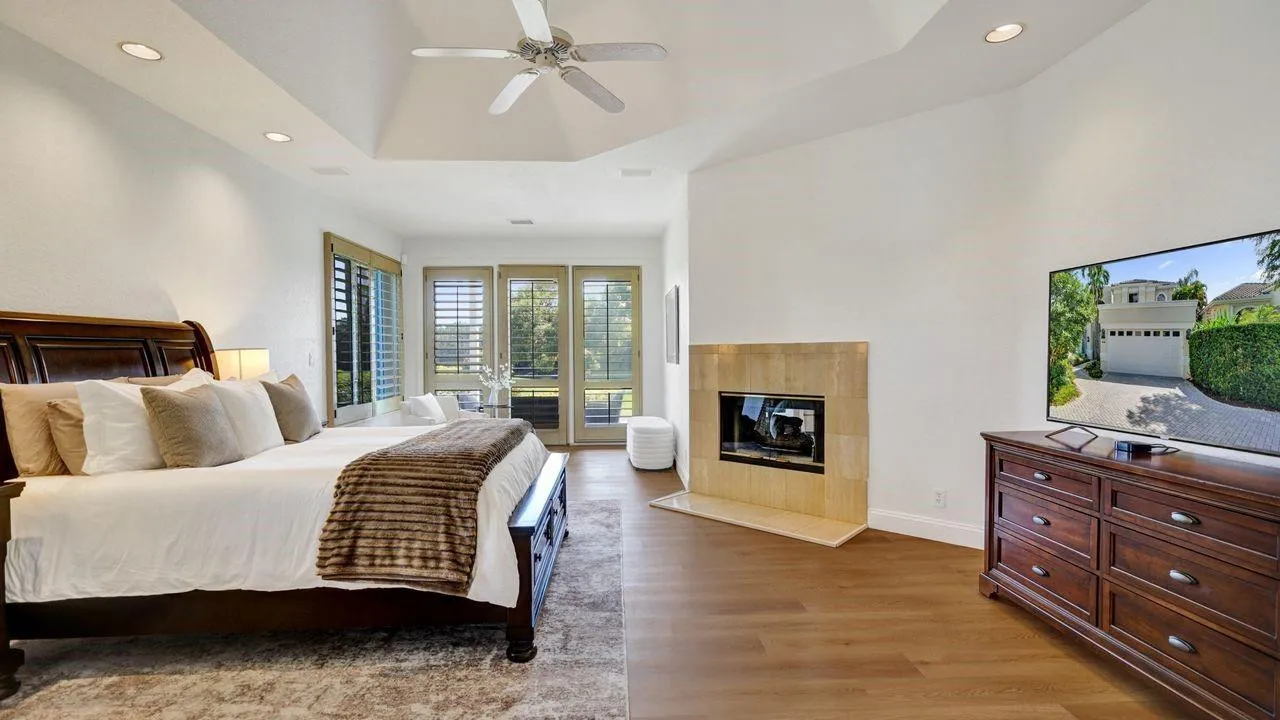 Brand new high-end vinyl plank flooring, double sided marble fireplace, wraparound golf/lake views.