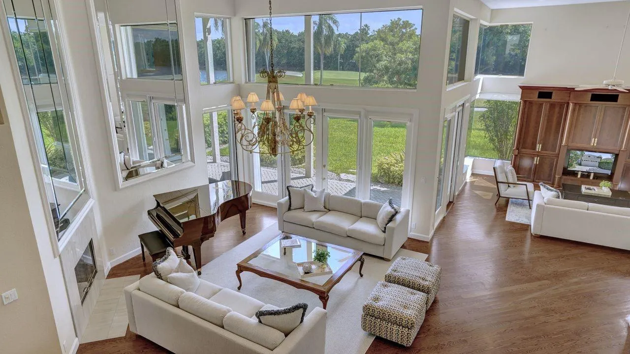 Not your average home! Soaring 20ft ceilings and dramatic walls of glass overlook the Tours Course of Weston Hills!