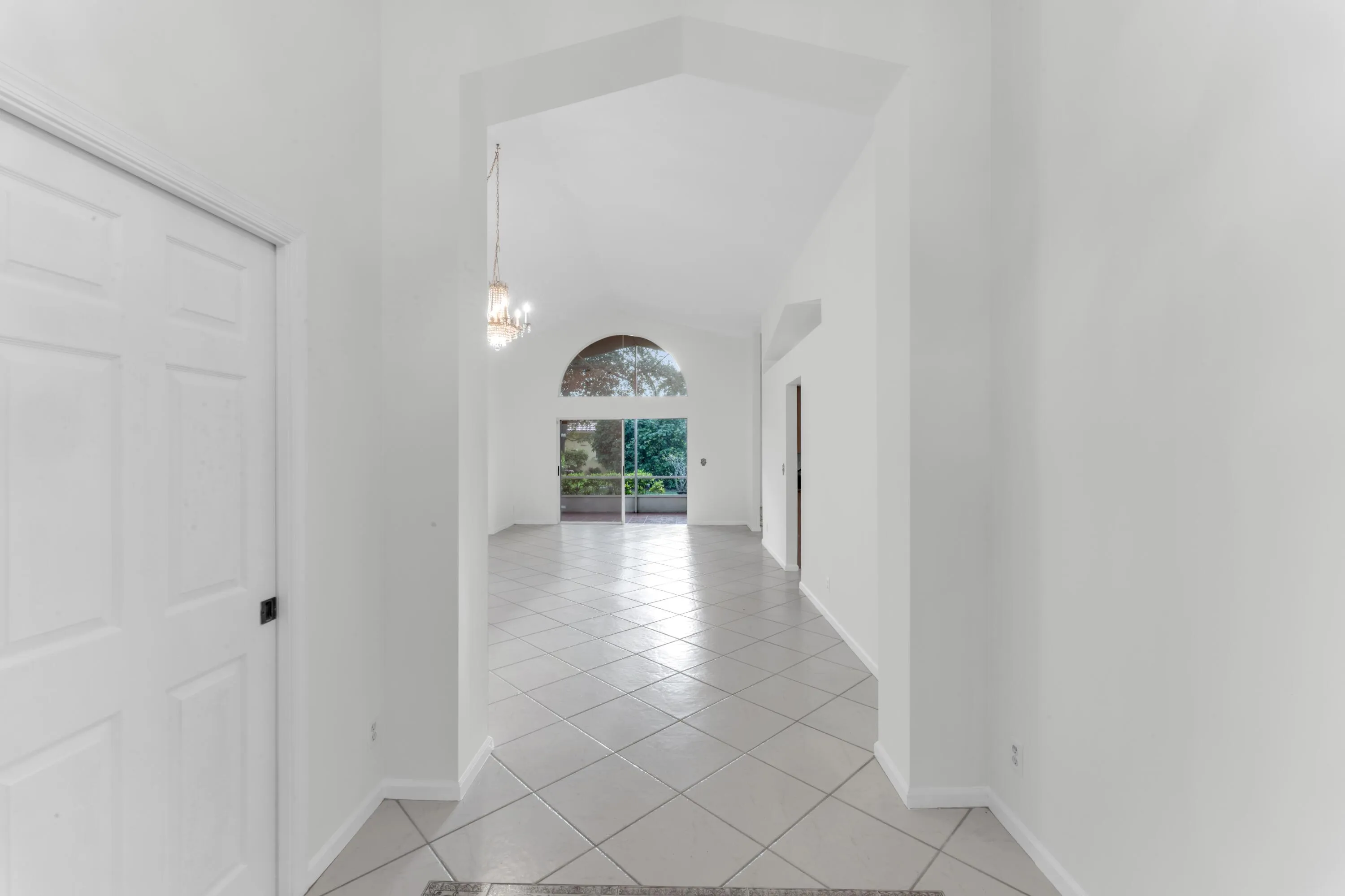 View to Patio. Plenty of natural light from the front and back.