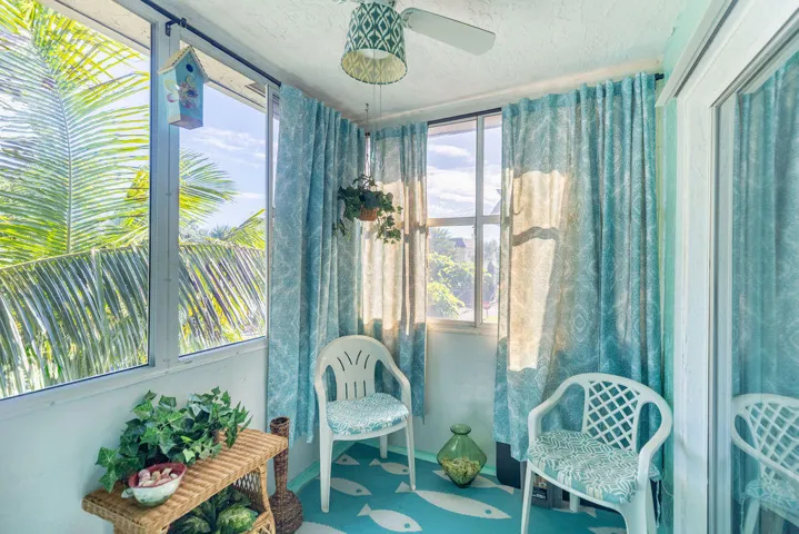 500 BONNIE BLVD 176 Balcony florida room for that morning coffee or evening paint and sip.