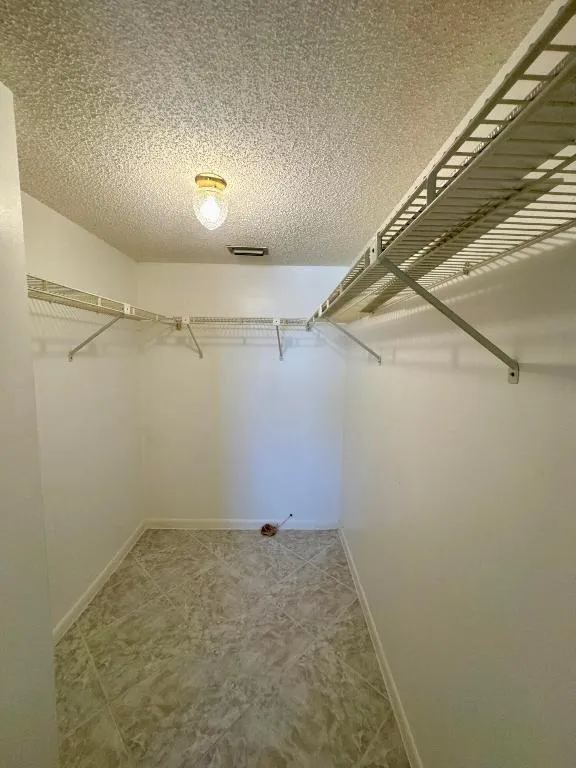 Main_Bedroom_Walk_In_Closet_7214_Golf_Co