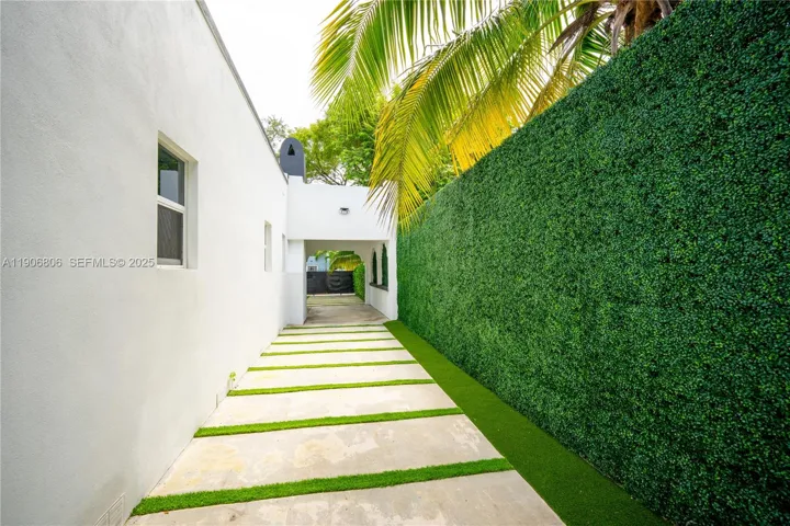 Privacy fence with a driveway