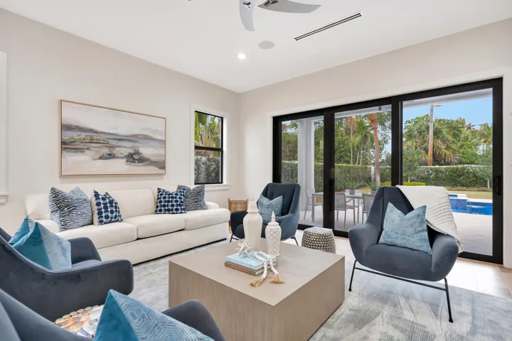 LIVING ROOM TO THE POOL