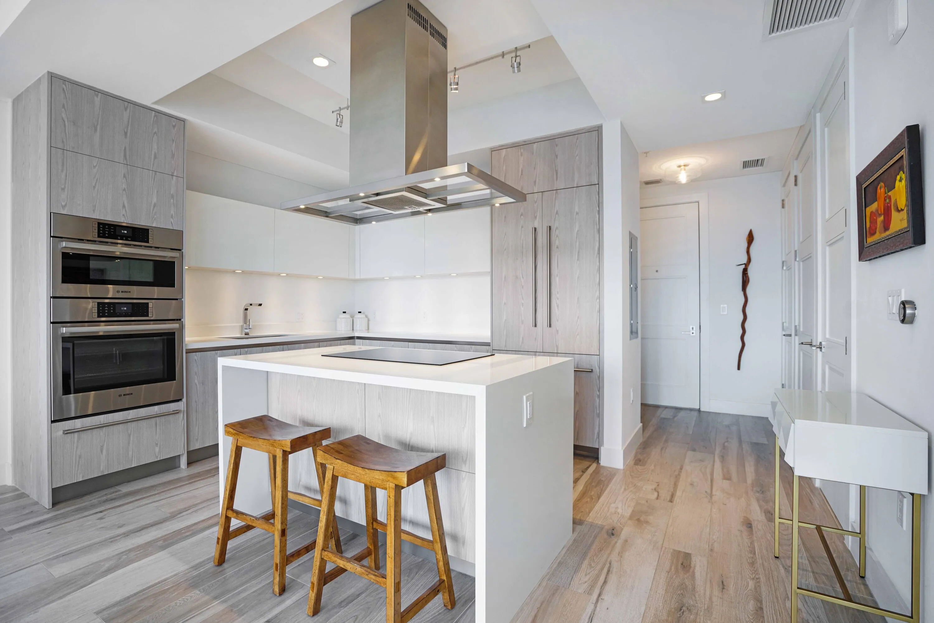 Kitchen with modern cabinetry and integrated appliances