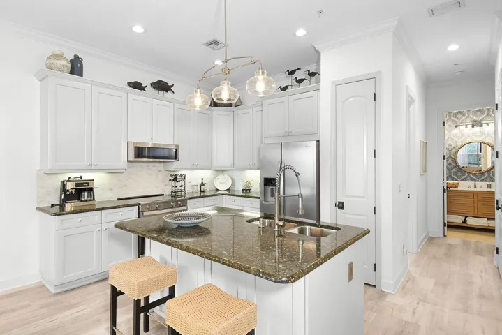 Kitchen new marble backsplash, s/s appliances and granite counters