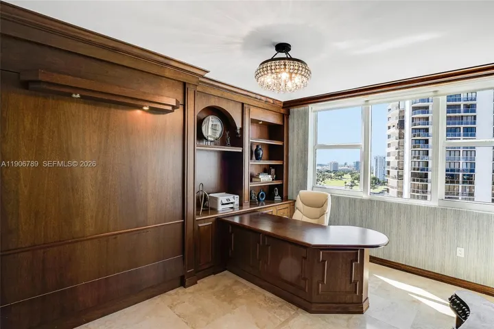 Office features a custom Murphy bed — perfect for guests or flexible use.