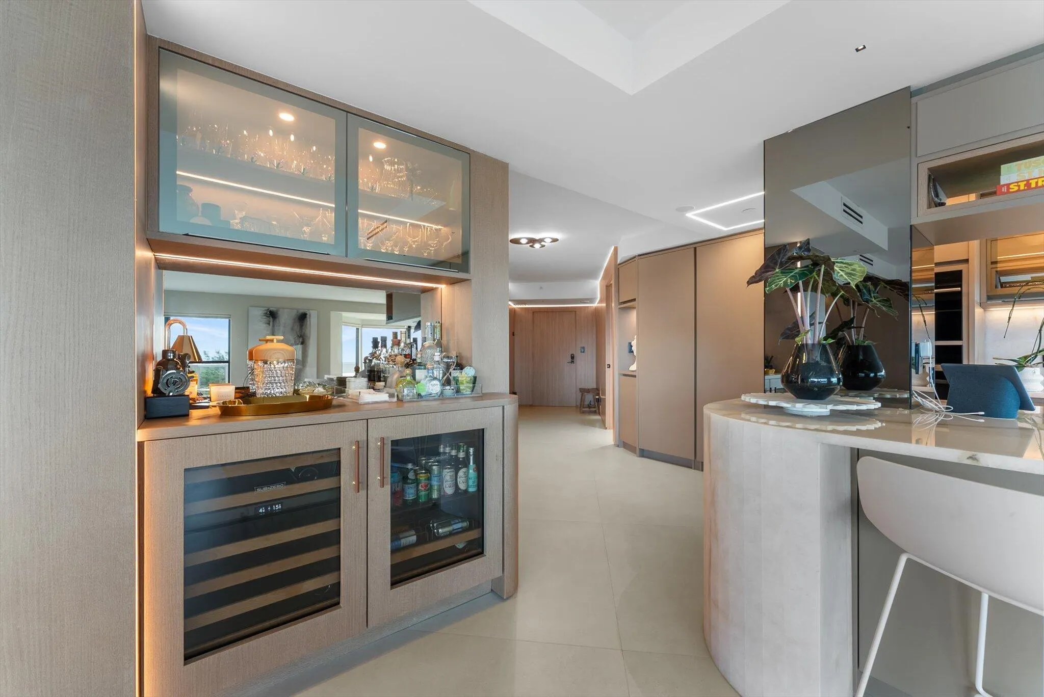 Wet bar with Subzero Wine Refrigerator and Beverage Center