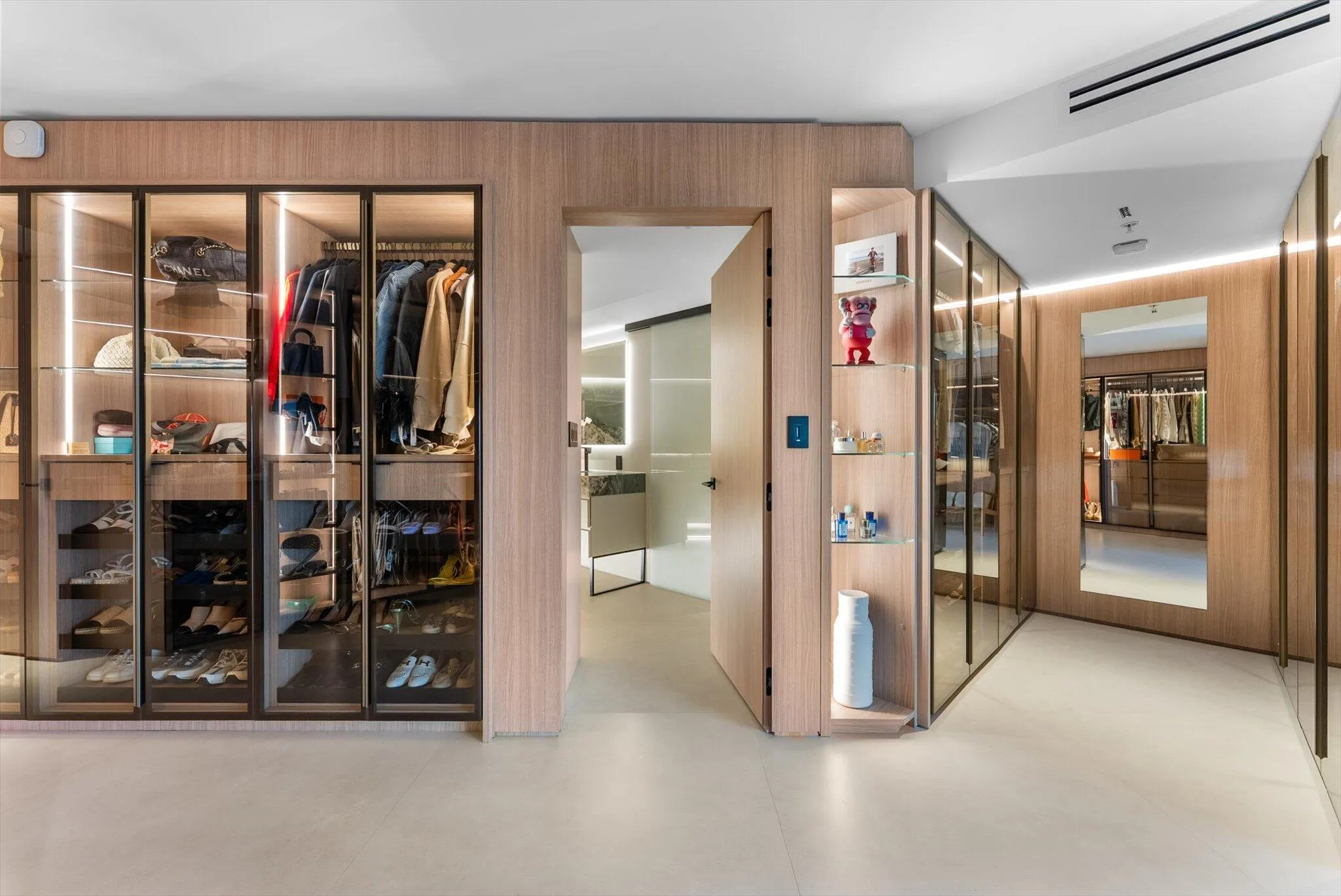 Oliver Designed Glass Wardrobe System is one of the most extraordinary and sophisticated installations in High End Luxury Design.