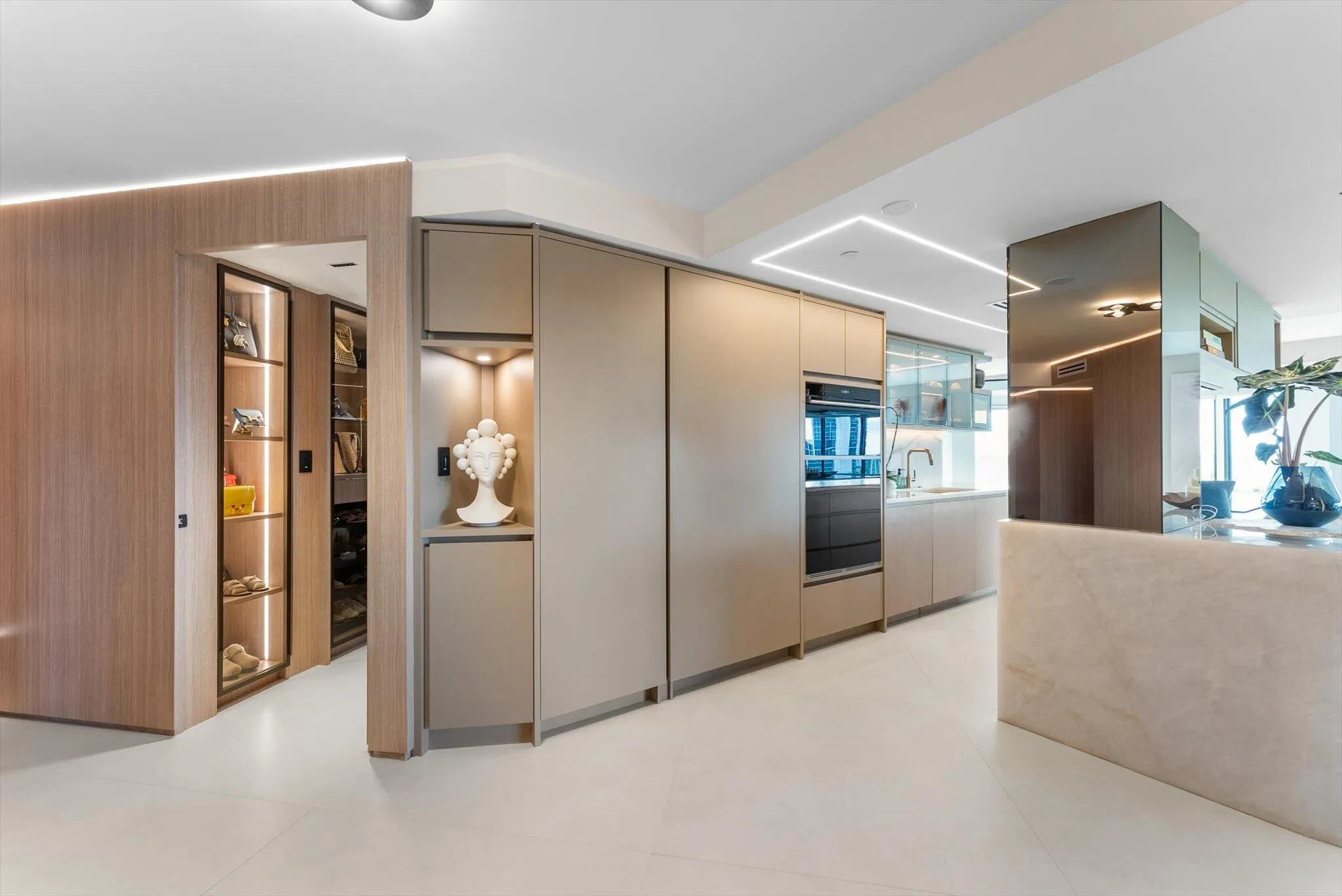 Seamless Millwork Integration - custom solid wood and glass doors/cabinetry