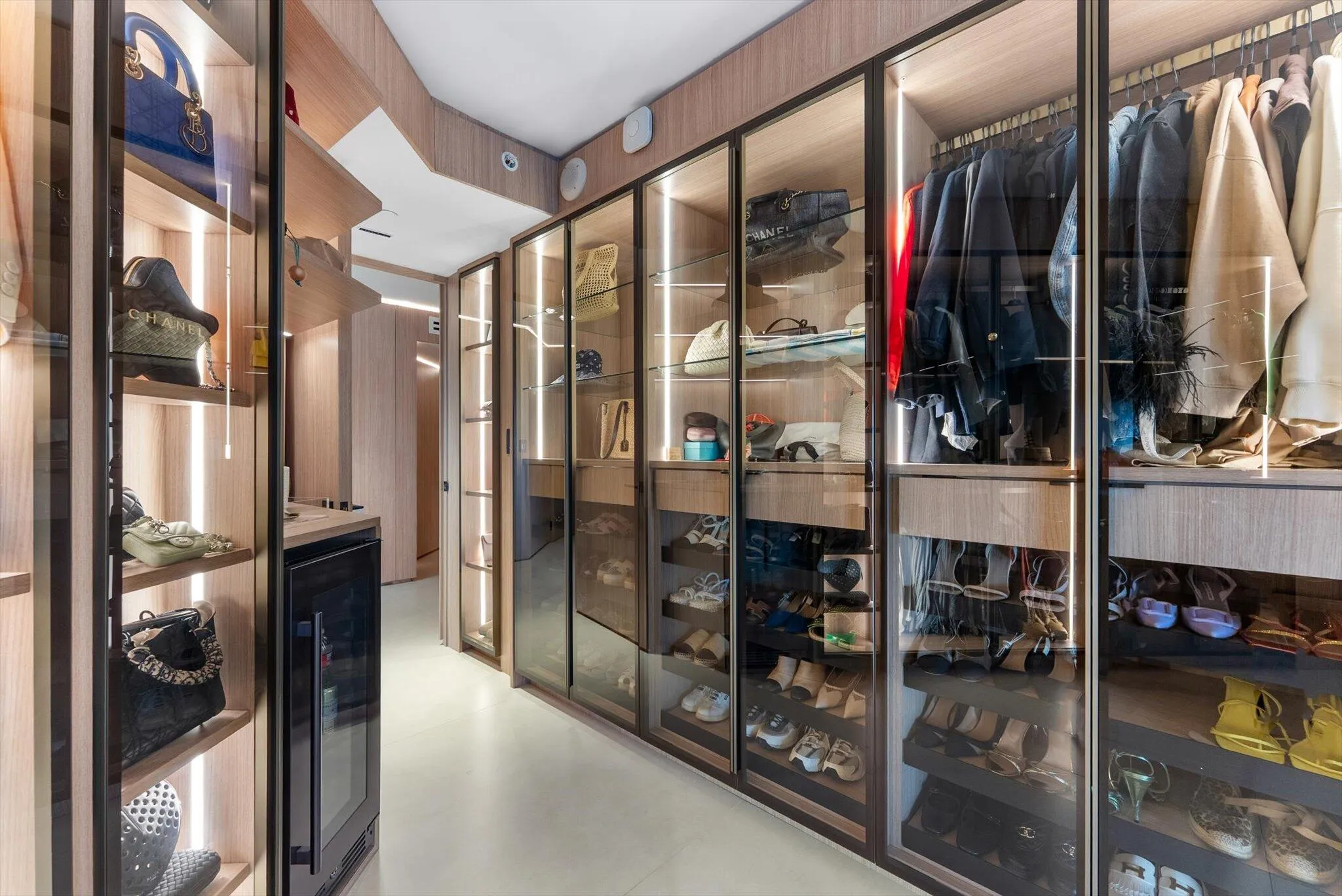Oliver Designed Glass Wardrobe System is one of the most extraordinary and sophisticated installations in High End Luxury Design.