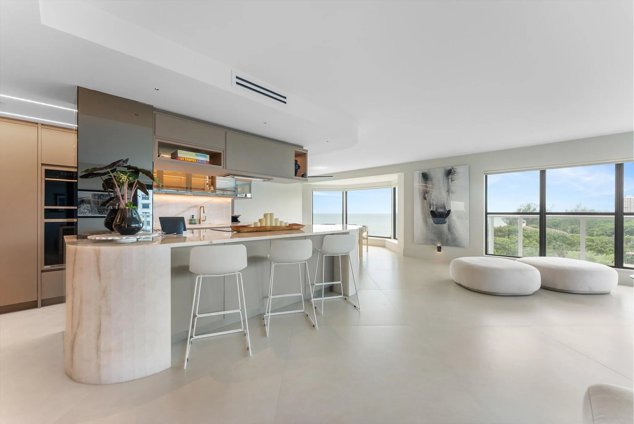 Custom Designed Island, Countertops, and backsplash: Cristallo Quartzite