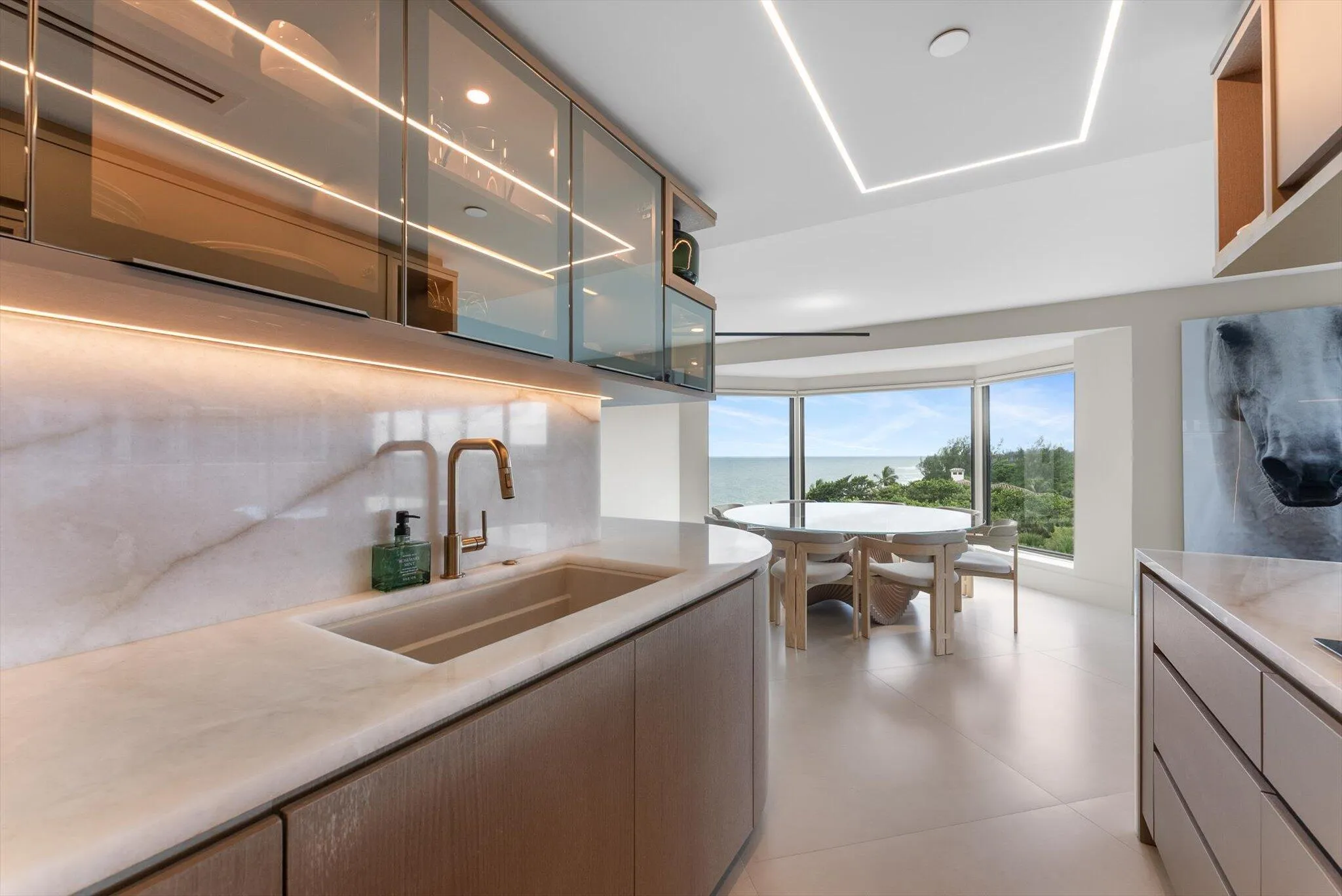 Cabinets: Custom-made Solid wood + Glass doors; Soft Close Drawers; Cristallo Quartzite Countertops and Backsplash