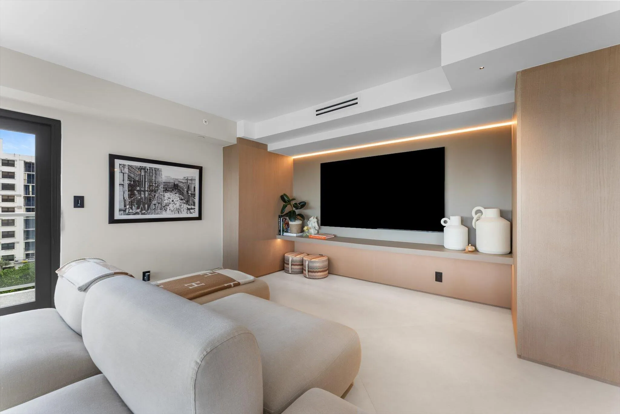 Custom Wood Living and Entertainment Area with LED Lighting