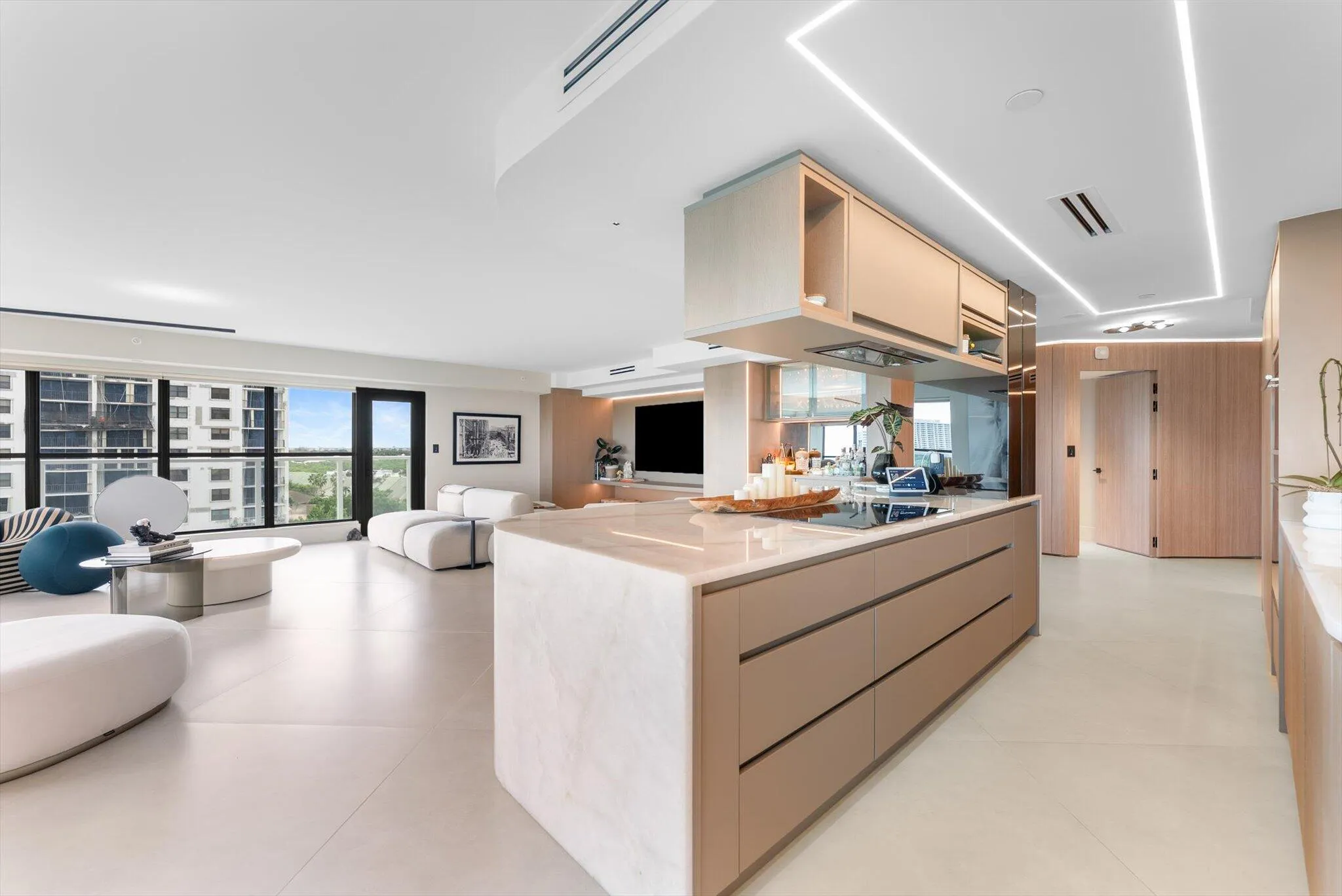 Cristallo Quartzite Custom Island with Wolf Induction Cooktop and Best Hood