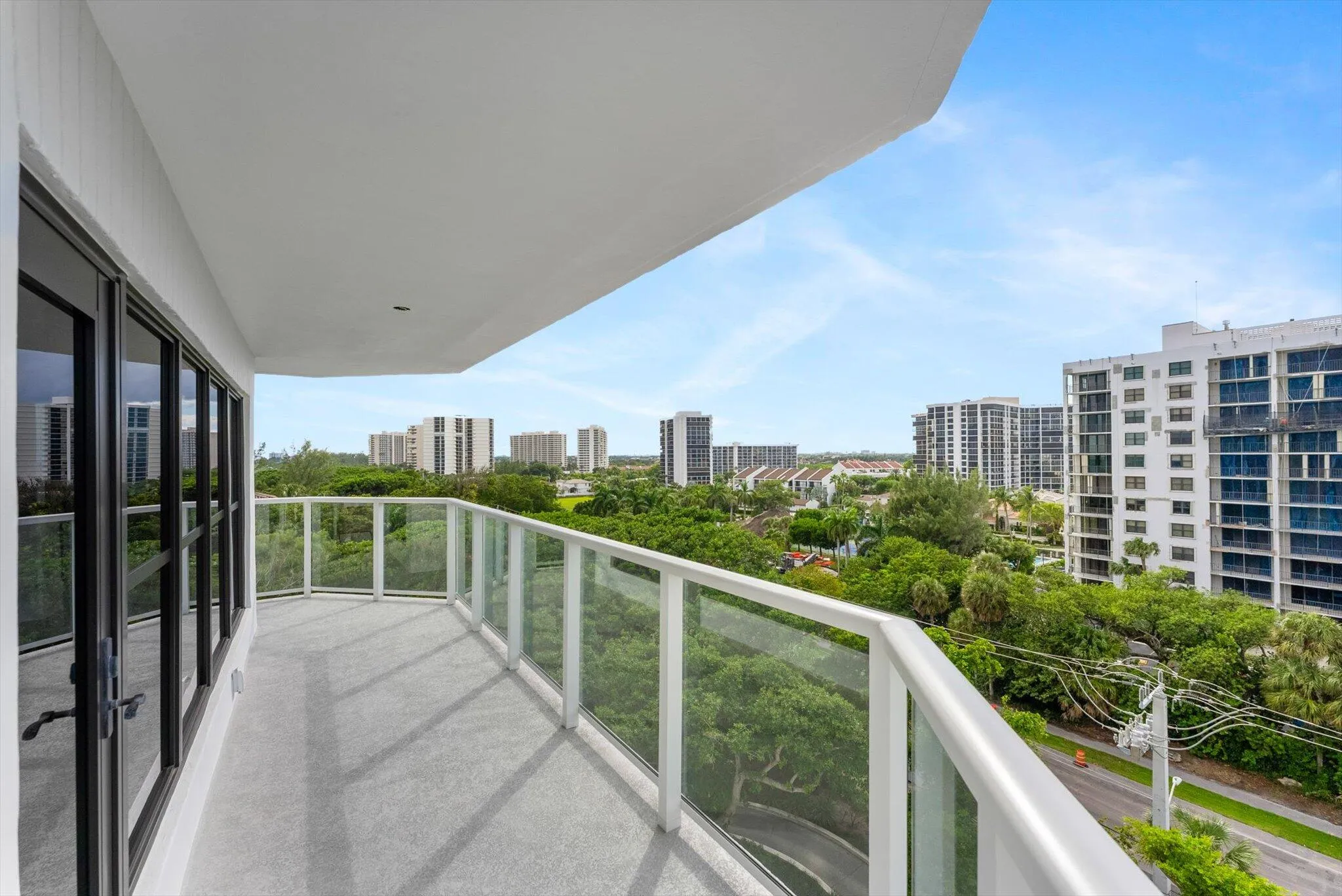Wrap around Balcony with new glass railings