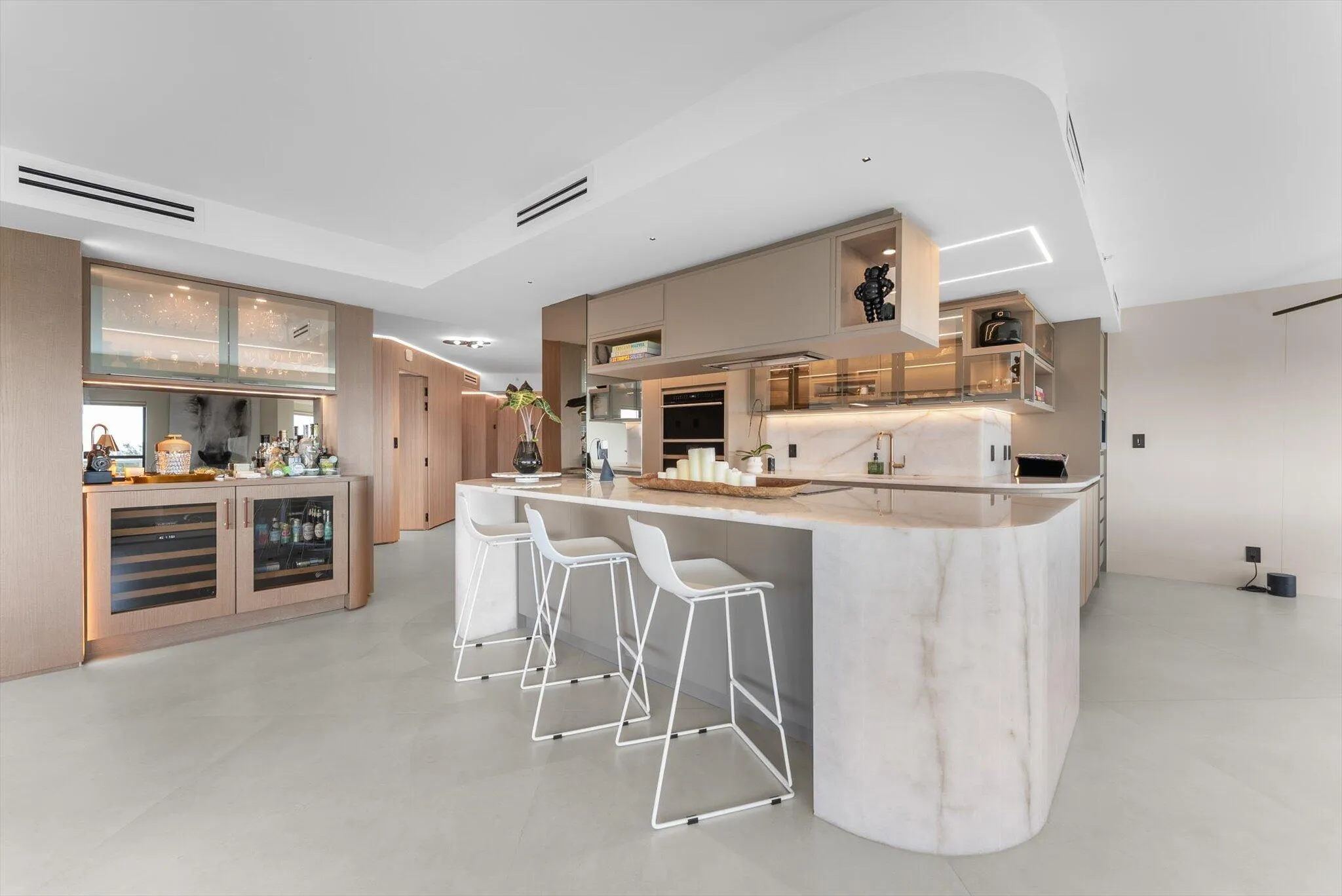 Custom Designed Island, Countertops, and backsplash: Cristallo Quartzite