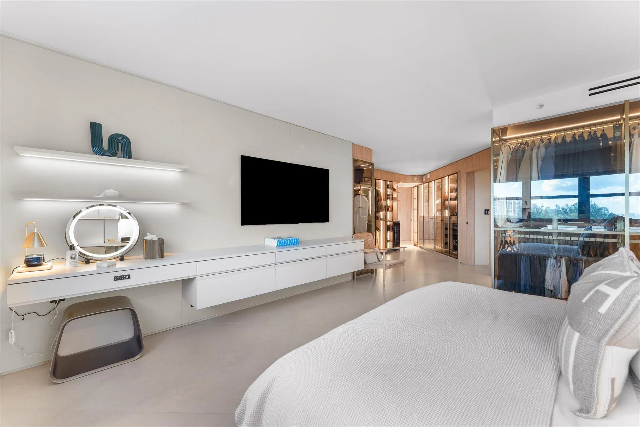Primary Suite - A Symphony of Glass, Lighting, Millwork, and Custom Design that rivals any five star resort.