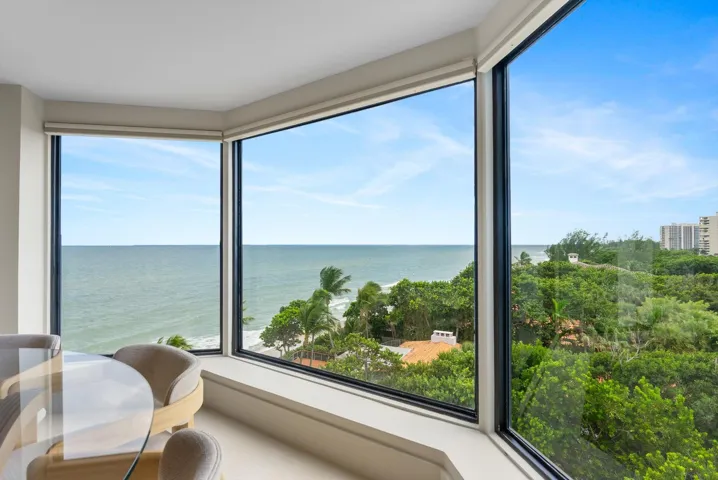 Architectural Dining Space framed by Expansive Glass