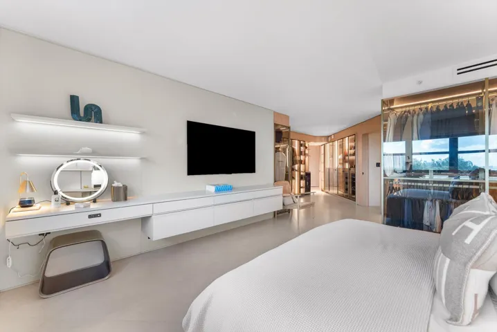 Primary Suite - A Symphony of Glass, Lighting, Millwork, and Custom Design that rivals any five star resort.