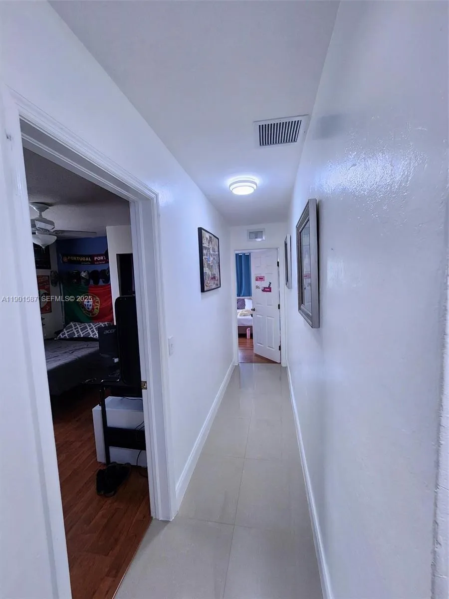 Hall from primary to bedrooms 2 & 3