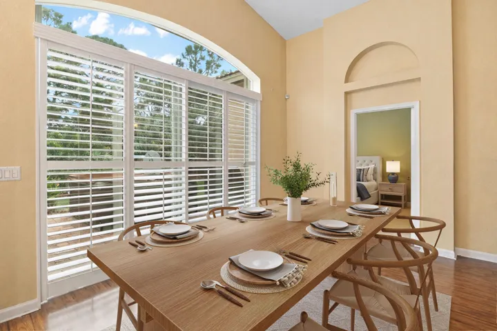 *Furniture has been virtually staged* Dining area featuring plenty of natural light from plantation shutters