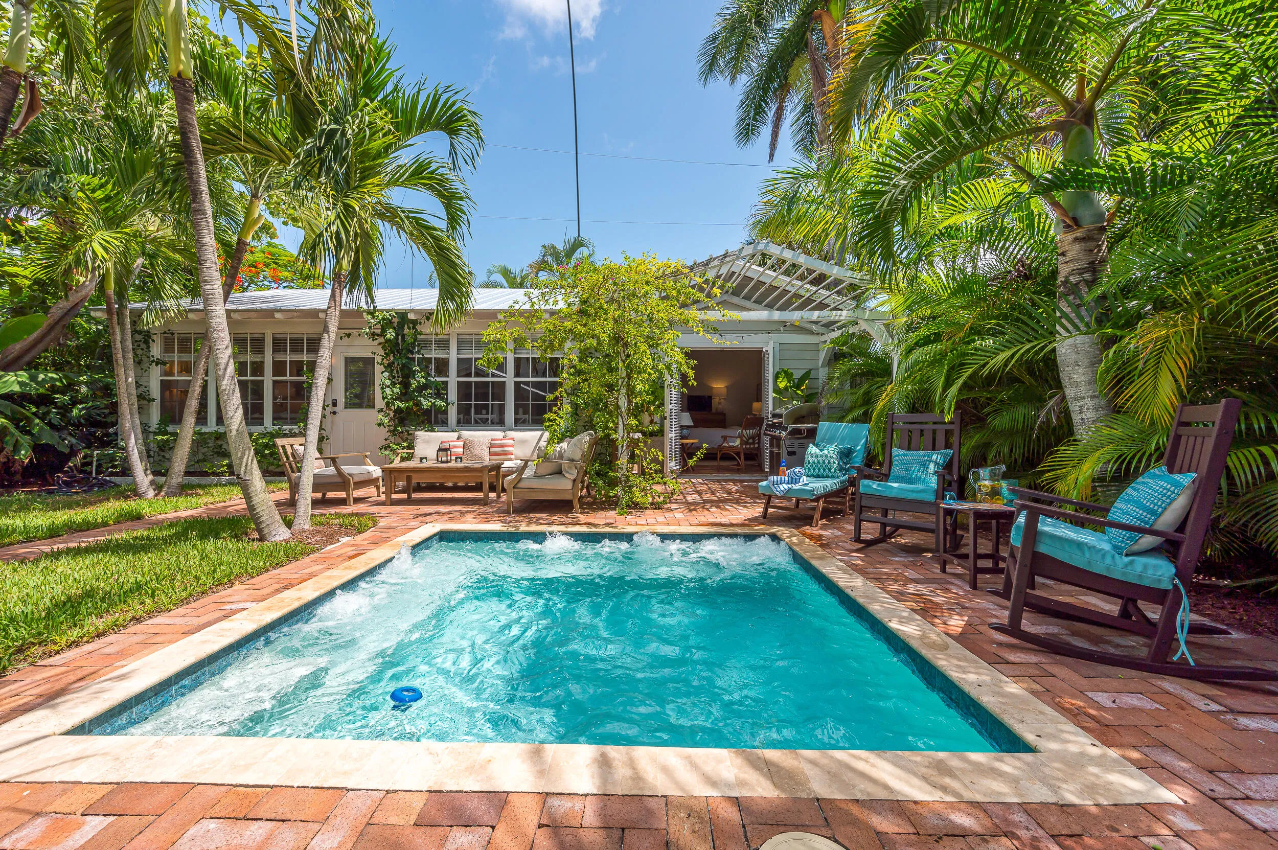 Pool area looking into guest house.