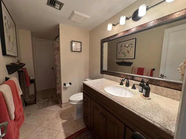 A comfortable and private guest bath for an effortless stay.