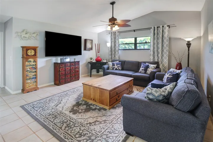 spacious living room with vaulted ceilings,