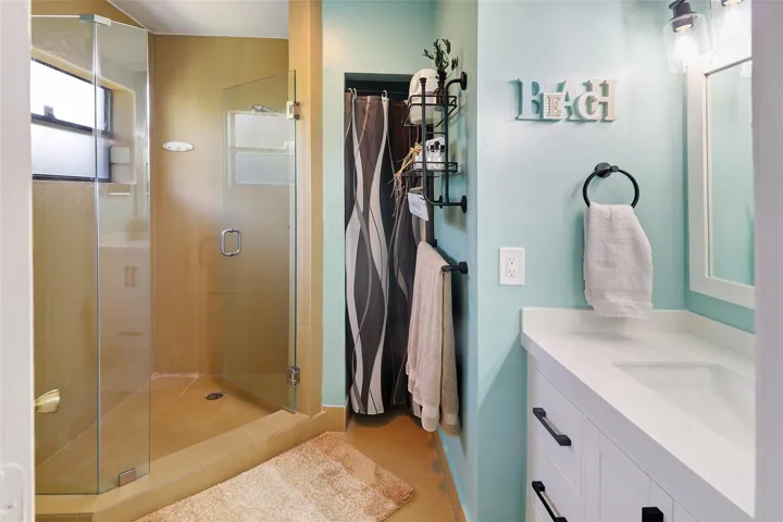 shower, linen closet, new vanity, mirror and lighting