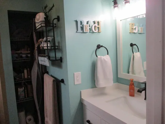 new vanity, mirror and lighting