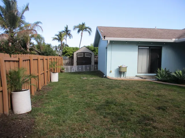 6x9 shed tucked away holding hurricane panels